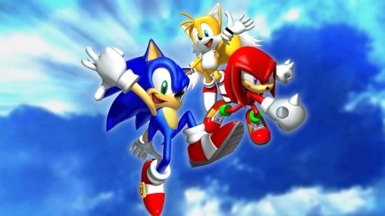 Tapeta Sonic: grafika promocyjna gry Sonic Heroes przedstawia Sonic, Knuckle i Tails, skaczących w powietrze na pochmurnym tle