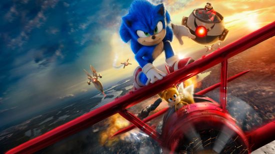 Tapeta z dźwiękiem: grafika promocyjna do filmu Sonic przedstawia Sonica na skrzydle czerwonego samolotu pilotowanego przez Tailsa